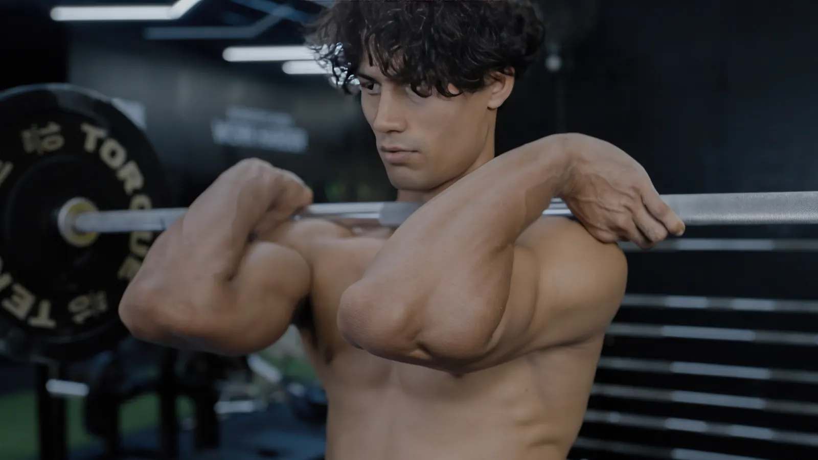 Athlete holding a barbell in the front-rack position before a front squat