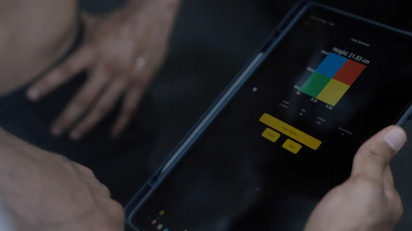 Tablet showing an athlete's jump-height quadrant report after a force-plate test