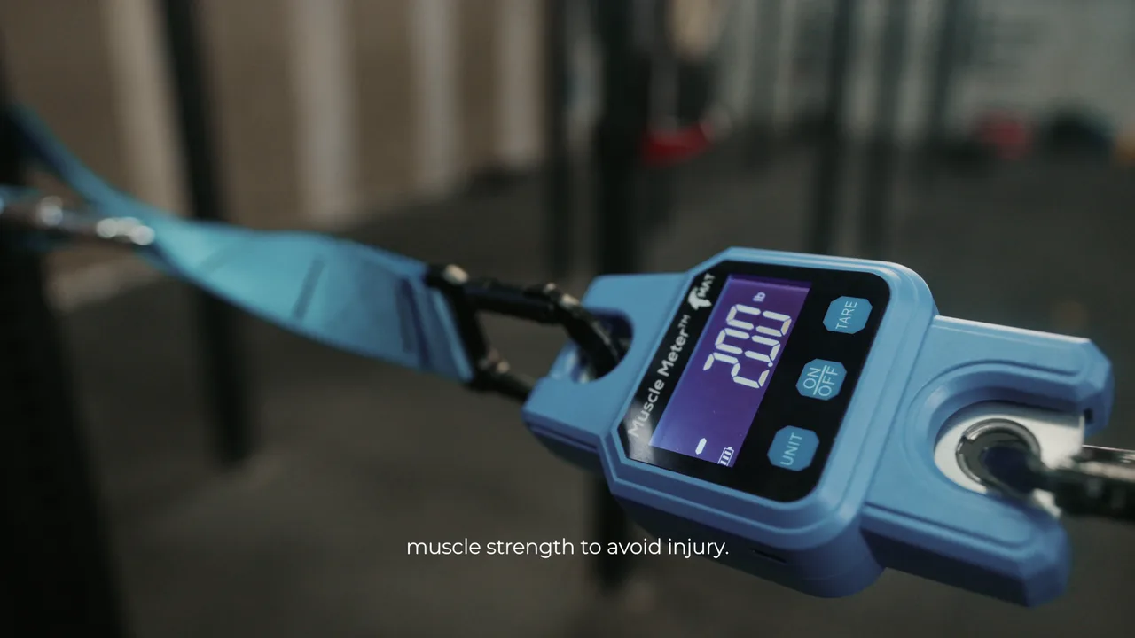 Handheld muscle-strength meter under tension on a strap